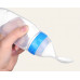 Botella biberón con cuchara para bebés