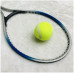 Raqueta de tenis con pelota